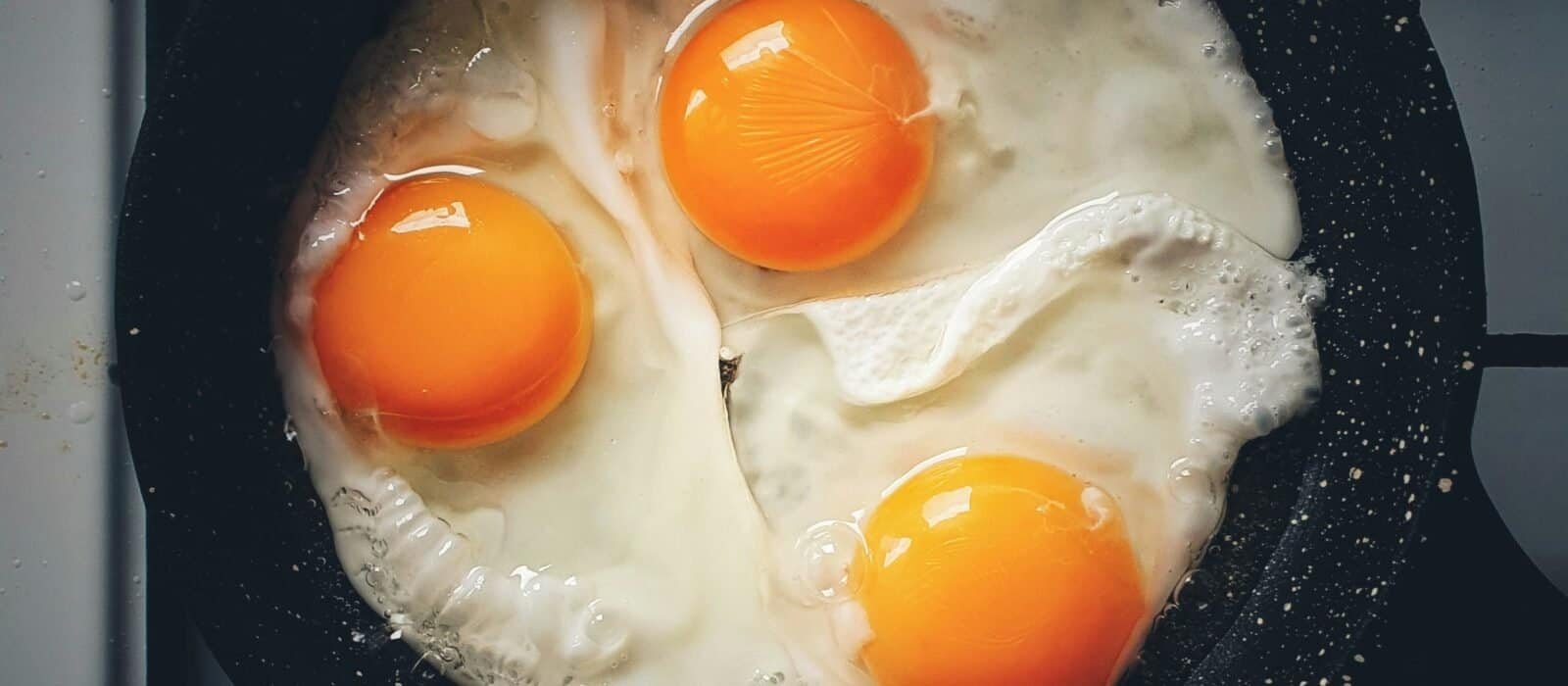 Why Do Eggs Stick to the Pan: Causes and Fixes